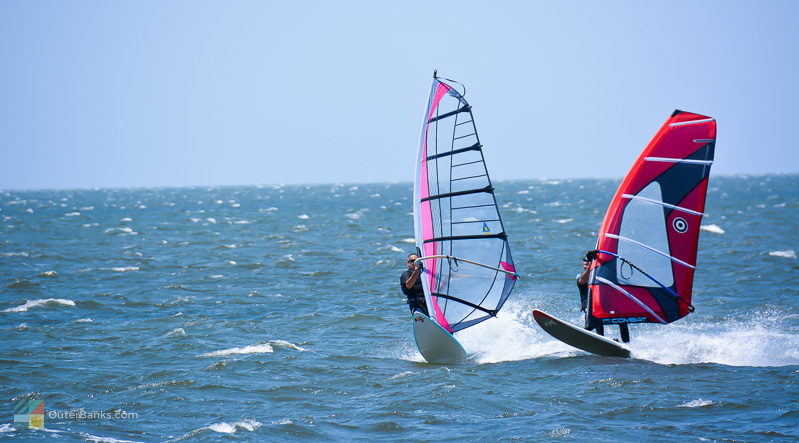 Windsurfers ride Pamlico sound off the coast of Waves